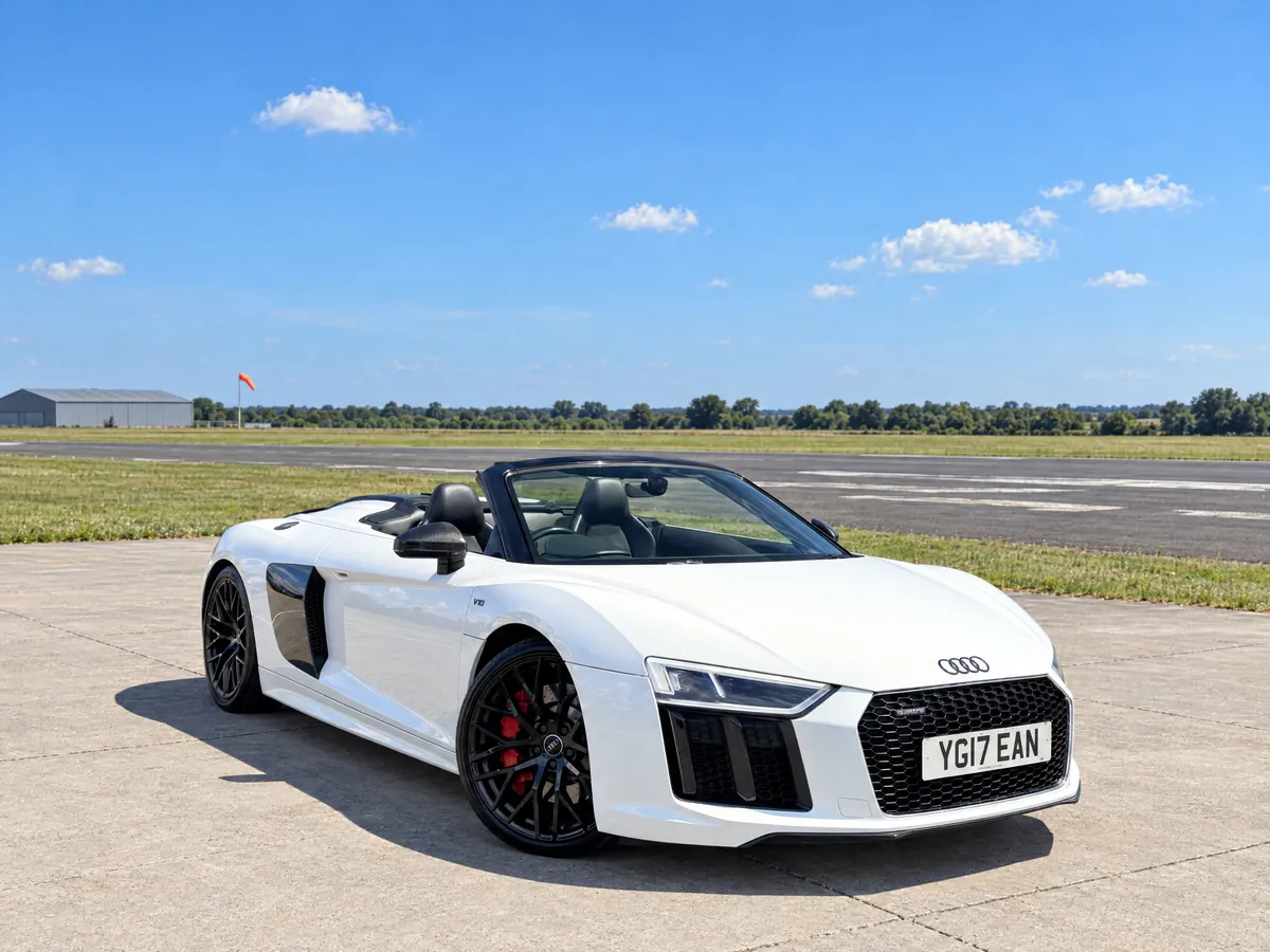 White Audi R8 Spyder, roof down, available for hire in Ipswich, Suffolk