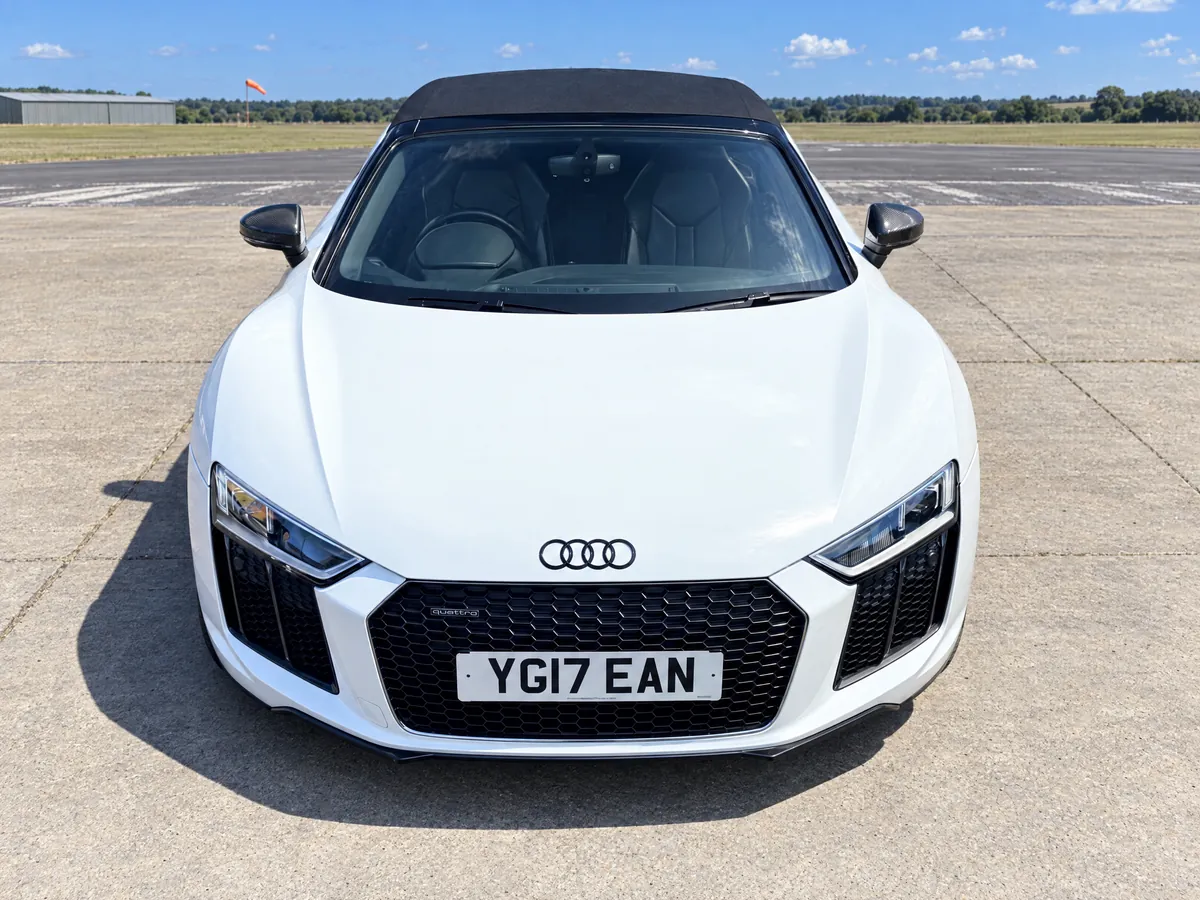 Front view of the white Audi R8 Spyder hire car available in King's Lynn