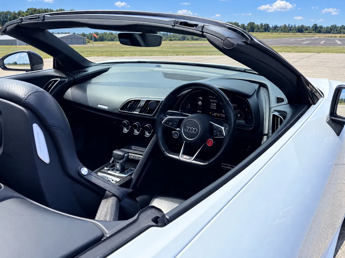 Open cockpit of the Audi R8 Spyder hire car in Norwich