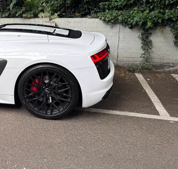 Rear of the white Audi R8 Spyder wedding hire car with LED tail lights